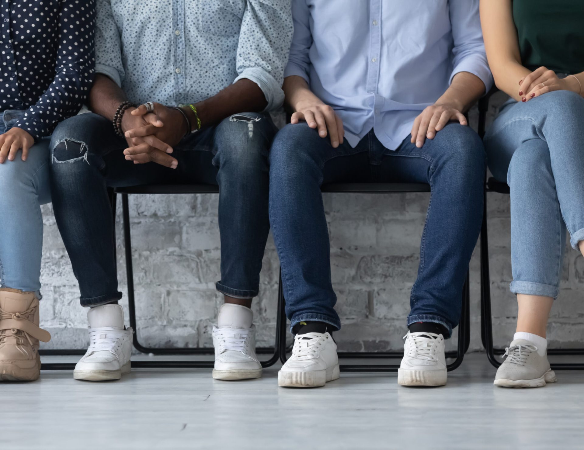 Close,Up,Cropped,Image,Legs,Of,Diverse,Candidates,Sitting,In